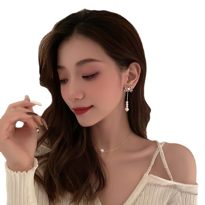 Elegant Pearl Bow Earrings