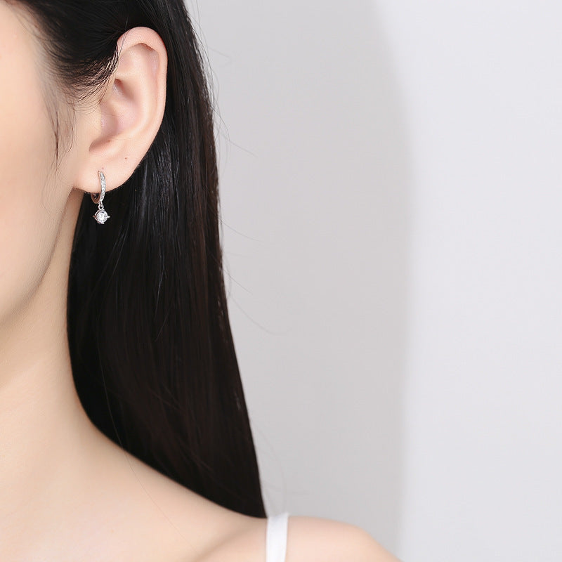 Elegant Silver Four-Claw Earrings